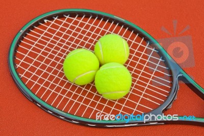 Tennis Ball With Racket Stock Photo