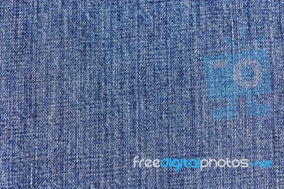 Texture Of Blue Jeans Textile Close Up Stock Photo