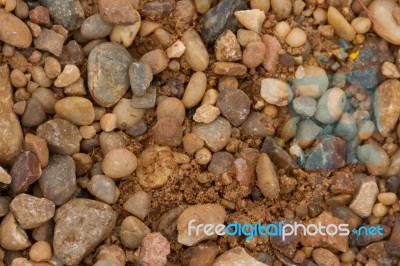 Textured Background Of Stones And River Sand Stock Photo