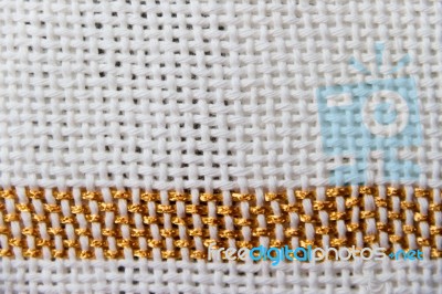 Textures Of Loom-woven Threads In White Tones With Golden Edges Stock Photo