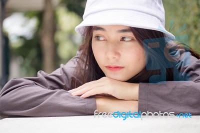 Thai Adult Girl White Cap Gray T-shirt Beautiful Girl Relax And Smile Stock Photo