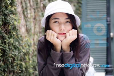 Thai Adult Girl White Cap Gray T-shirt Beautiful Girl Relax And Smile Stock Photo