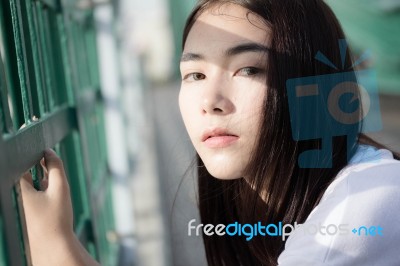 Thai Adult Girl White T-shirt Beautiful Girl Relax And Smile Stock Photo