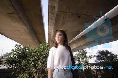 Thai Adult Girl White T-shirt Beautiful Girl Relax And Smile Stock Photo