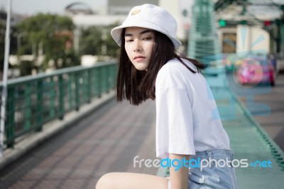 Thai Adult Girl White T-shirt Beautiful Girl Relax And Smile Stock Photo