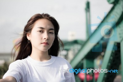 Thai Adult Girl White T-shirt Beautiful Girl Relax And Smile Stock Photo