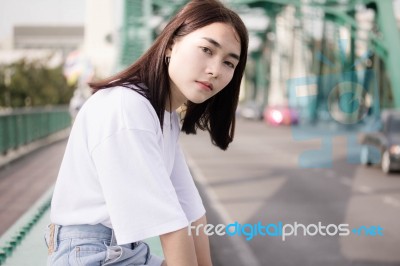 Thai Adult Girl White T-shirt Beautiful Girl Relax And Smile Stock Photo