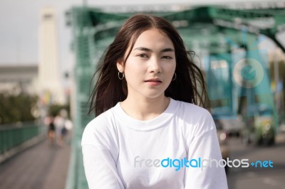 Thai Adult Girl White T-shirt Beautiful Girl Relax And Smile Stock Photo