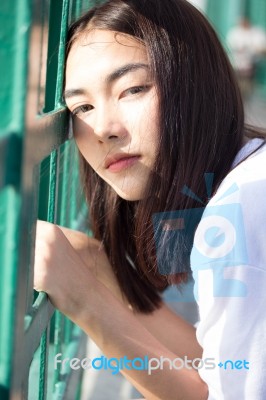 Thai Adult Girl White T-shirt Beautiful Girl Relax And Smile Stock Photo