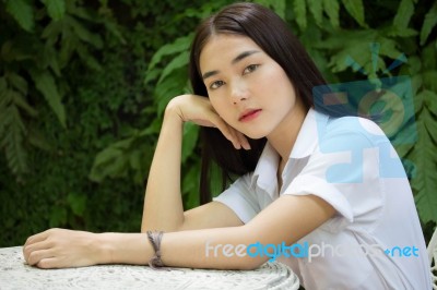 Thai Adult Student University Uniform Beautiful Girl Relax And Smile Stock Photo