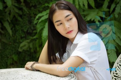 Thai Adult Student University Uniform Beautiful Girl Relax And Smile Stock Photo