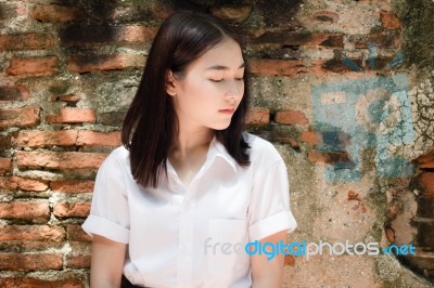 Thai Adult Student University Uniform Beautiful Girl Relax And Smile Stock Photo