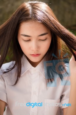 Thai Adult Student University Uniform Beautiful Girl Relax And Smile Stock Photo