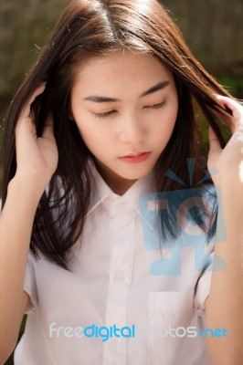 Thai Adult Student University Uniform Beautiful Girl Relax And Smile Stock Photo