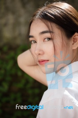 Thai Adult Student University Uniform Beautiful Girl Relax And Smile Stock Photo