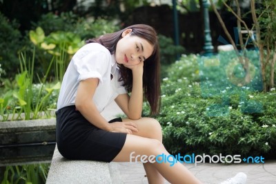 Thai Adult Student University Uniform Beautiful Girl Relax And Smile Stock Photo