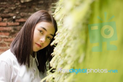 Thai Adult Student University Uniform Beautiful Girl Relax And Smile Stock Photo