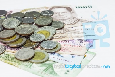 Thai Bank Note And Coins Stock Photo