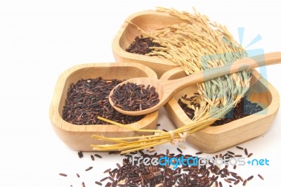 Thai Black Jasmine Rice (rice Berry) In Wooden Bowl Stock Photo