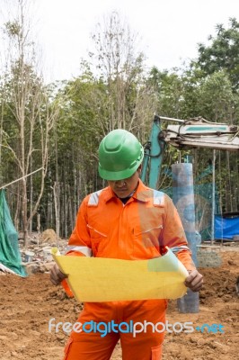 Thai Construction Site Worker Stock Photo