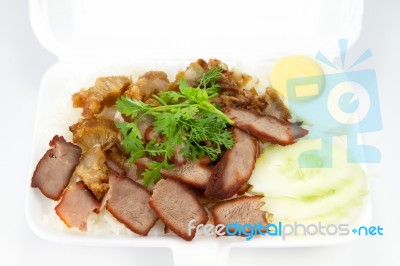 Thai Cuisine, Red Pork And Crispy Pork Over Rice Stock Photo