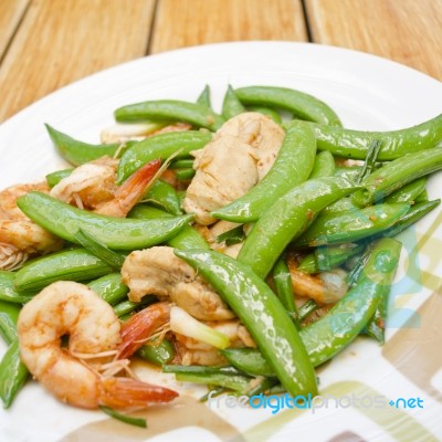 Thai-food Fried Shrimp, Pork And Sweet Peas Stock Photo