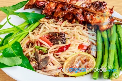 Thai Food Speak (somtam Kaiyang) : Papaya Spicy Salad With Salte… Stock Photo