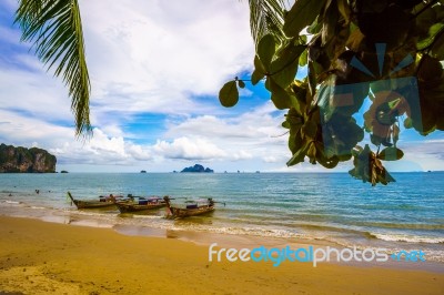 Thai Long Tail Boats On A Beach Stock Photo