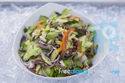 Thai Style Spicy Beef Salad With Cucumber Stock Photo