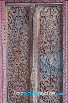 Thai Vintage Craving Door In Temple Stock Photo