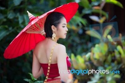 Thai Woman In Traditional Costume Stock Photo