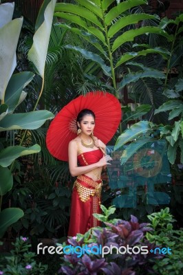 Thai Woman In Traditional Costume Stock Photo