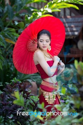 Thai Woman In Traditional Costume Stock Photo