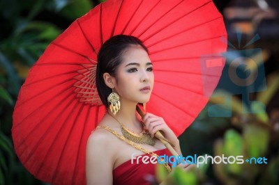 Thai Woman In Traditional Costume Stock Photo