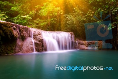 Thailand Waterfall With Sunbeam In Kanjanaburi (erawan Waterfall… Stock Photo