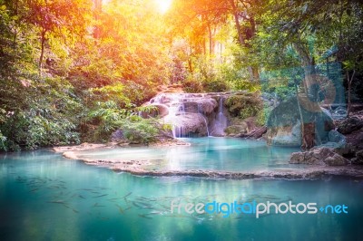 Thailand Waterfall With Sunbeam In Kanjanaburi (erawan Waterfall… Stock Photo