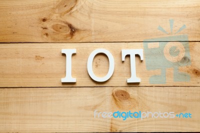 The Acronym Iot Internet Of Things On Wooden Background Stock Photo