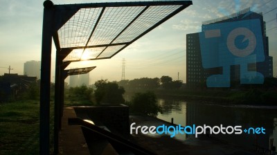 The Audience Stands For The Inner Stream Of The City. Scenery With A Charming Sunrise Stock Photo