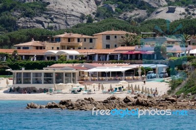 The Beach At Baja Sardinia Stock Photo