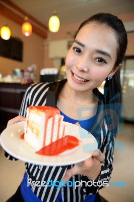 The Beautiful Smiling Asian Woman With A Cake Stock Photo