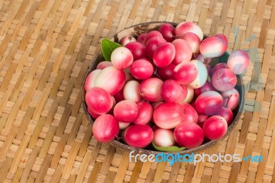 The Bengal-currants In Coconut Shell Stock Photo