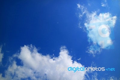 The Blue Sky And Beautiful White Clouds Stock Photo