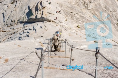 The Cables Up Half Dome In Yosemite National Park Stock Photo