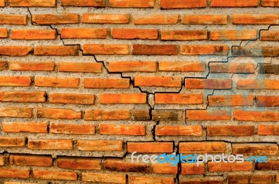 The Crack Wall From Brick And Brick Background, Red Crack Brick And Pattern Of Crack Brick Wall Background Stock Photo