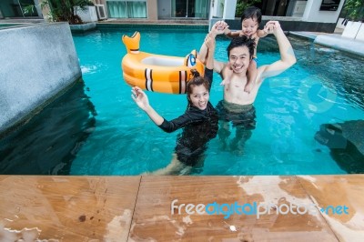 The Family Having Fun Together Stock Photo