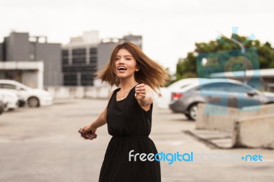 The Girl At The Car Park Stock Photo