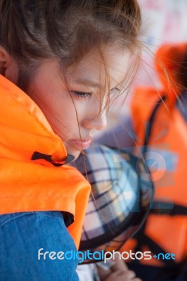 The Girl In Life Jacket Stock Photo