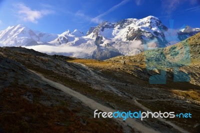 The Hiker Are Walking From Rotenboden Station Toriffelsee Lake Stock Photo