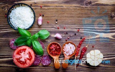 The Ingredients For Homemade Pizza On Shabby Wooden Background Stock Photo