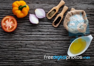 The Ingredients For Homemade Pizza On Shabby Wooden Background Stock Photo